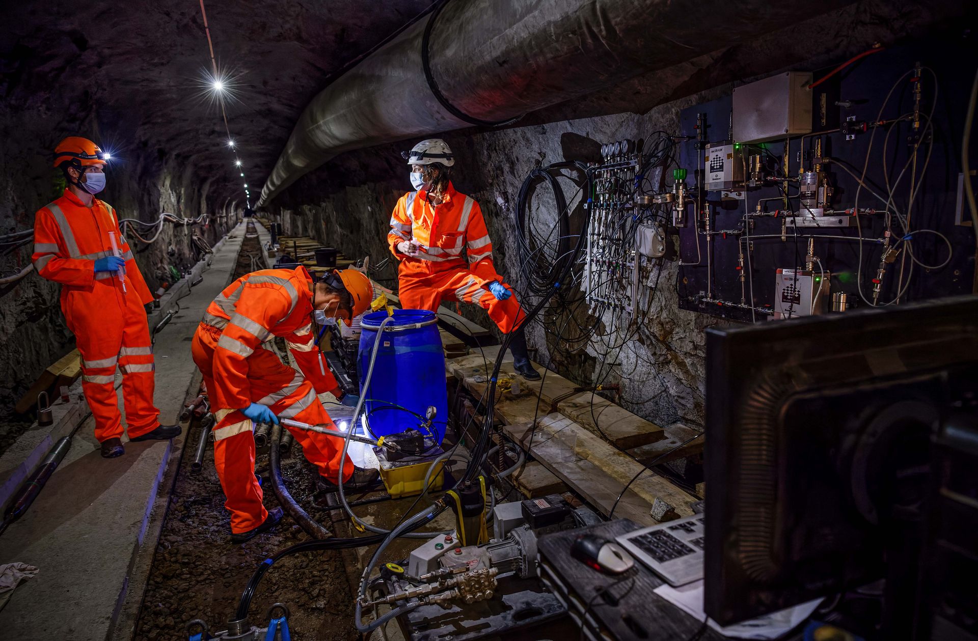 Three researchers in the Bedretto Underground Lab