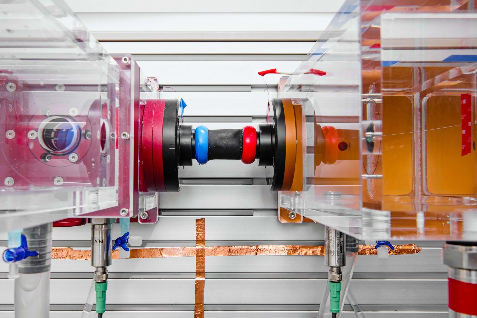 Photo of a testing unit that simulates how blood circulates through the chambers of the heart when an artificial muscle boosts pumping capacity.