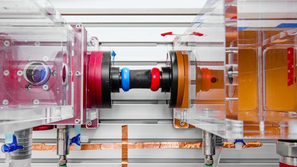 Photo of a testing unit that simulates how blood circulates through the chambers of the heart when an artificial muscle boosts pumping capacity.